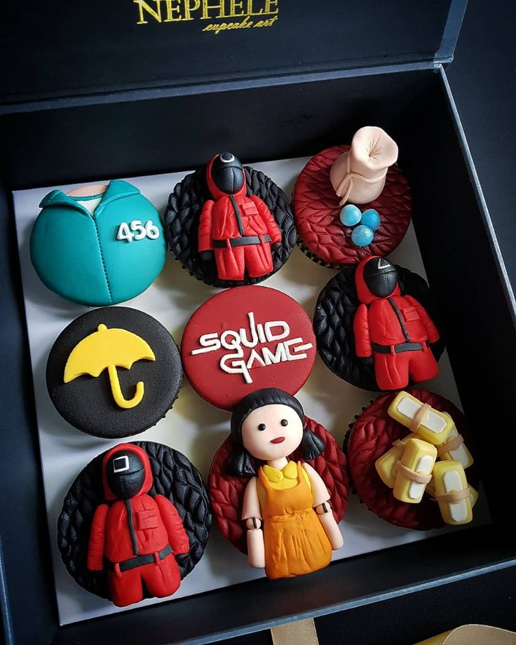 Nephele Cupcake Art — Squid Game themed fondant cupcakes in a signature gift box